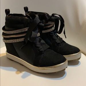 Beautiful Stuart Weitzman high top shoes.